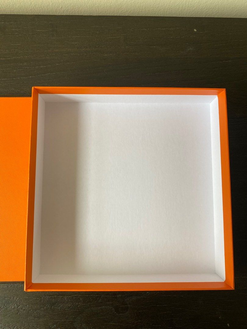 Authentic Hermes Gift Box (Category: Luxury) located in Etobicoke. Submitted by simona_xoxo (Listing ID 1267731191, Image 2). Description: In excellent condition, great for jewellery and other small accessories. Gift receipt and receipt holder are included. Interior dimensions: 7.5” x 7.5” x 1.5”.