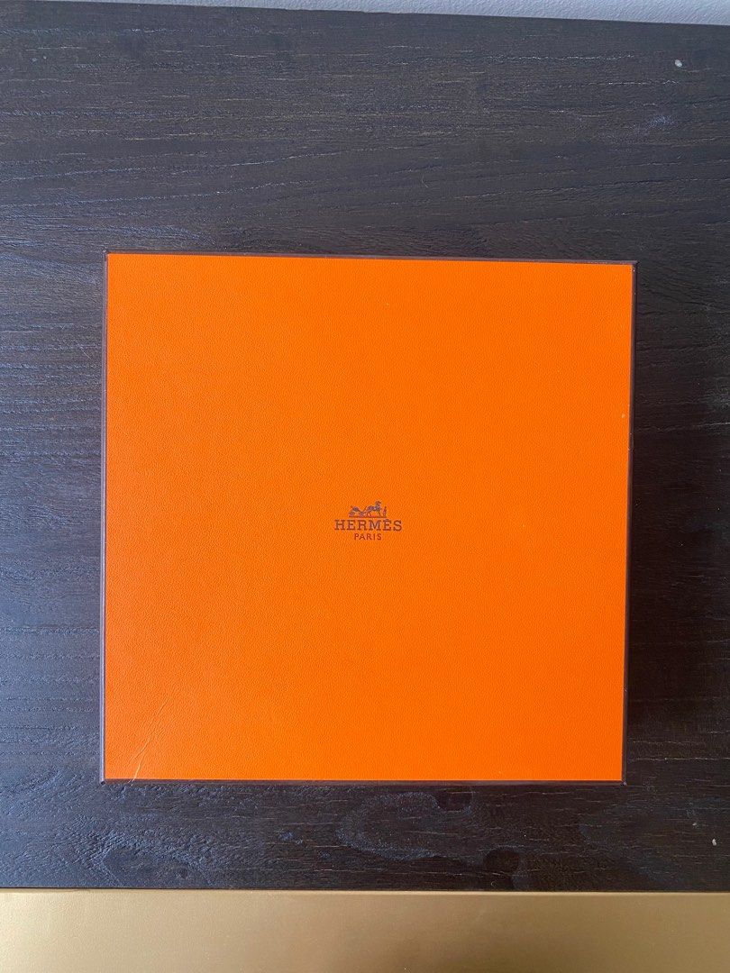 Authentic Hermes Gift Box (Category: Luxury) located in Etobicoke. Submitted by simona_xoxo (Listing ID 1267731191, Image 1). Description: In excellent condition, great for jewellery and other small accessories. Gift receipt and receipt holder are included. Interior dimensions: 7.5” x 7.5” x 1.5”.
