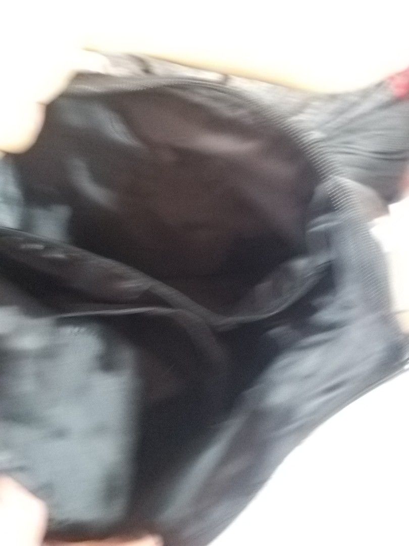 Backpack (Category: Backpacks) located in Singapore. Submitted by f16falcon (Listing ID 1267577403, Image 4). Description: has a hidden compartment in the back area to hide valuables. ruler in photo is 30cm, use as reference in gauging size. comes with a free water bottle..