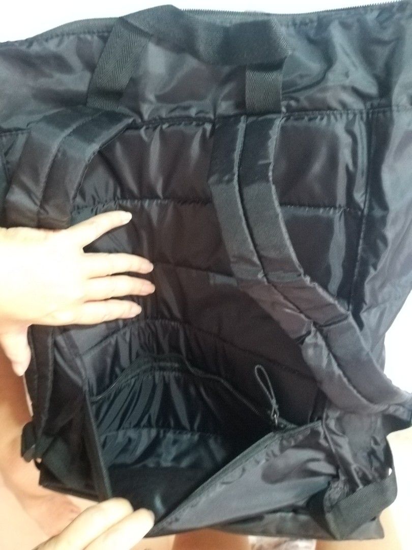 Backpack (Category: Backpacks) located in Singapore. Submitted by f16falcon (Listing ID 1267577403, Image 3). Description: has a hidden compartment in the back area to hide valuables. ruler in photo is 30cm, use as reference in gauging size. comes with a free water bottle..