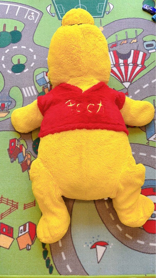 Big pooh bear plush clearance