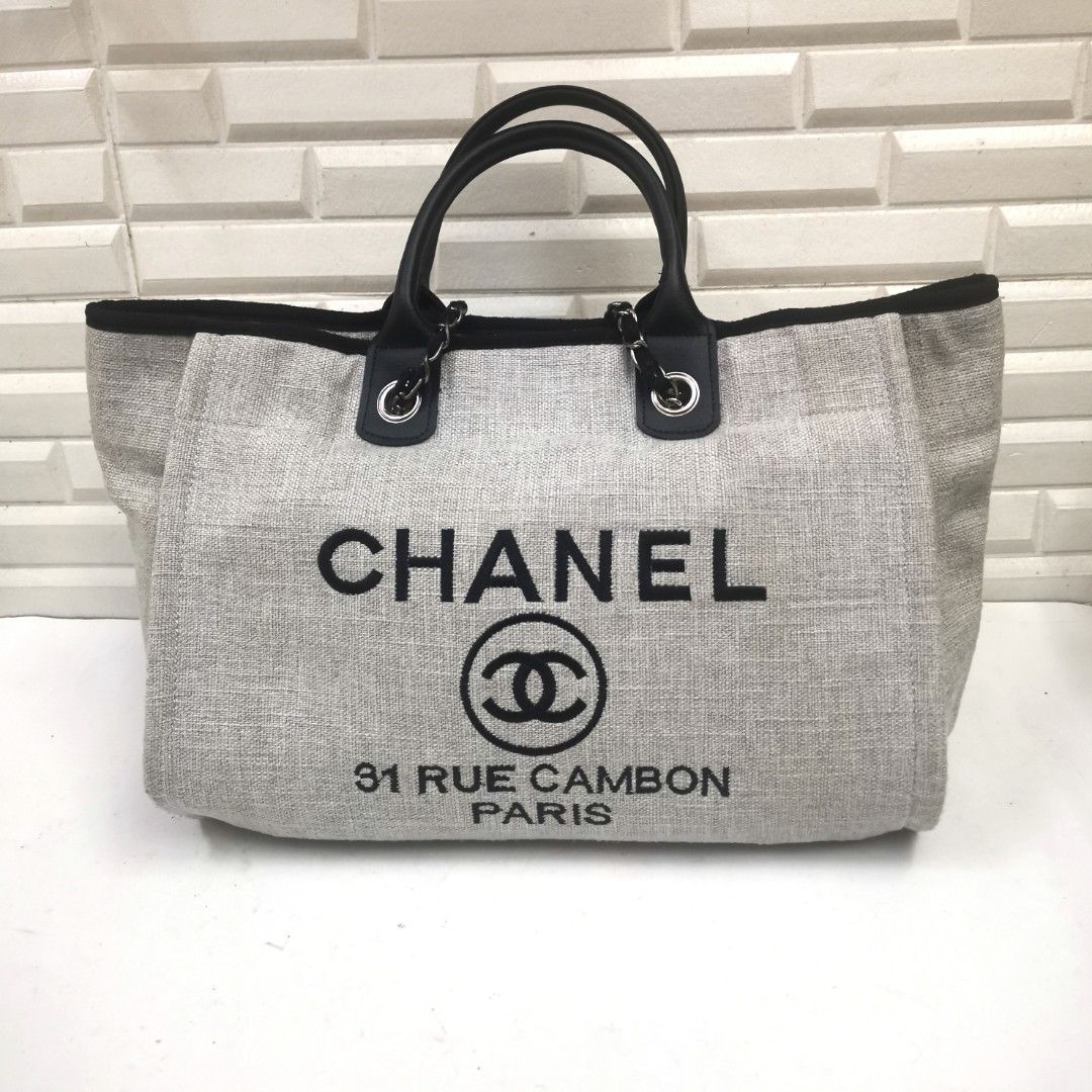 CHANEL Woven Straw Raffia Deauville Medium Tote Grey, Luxury, Bags &  Wallets on Carousell