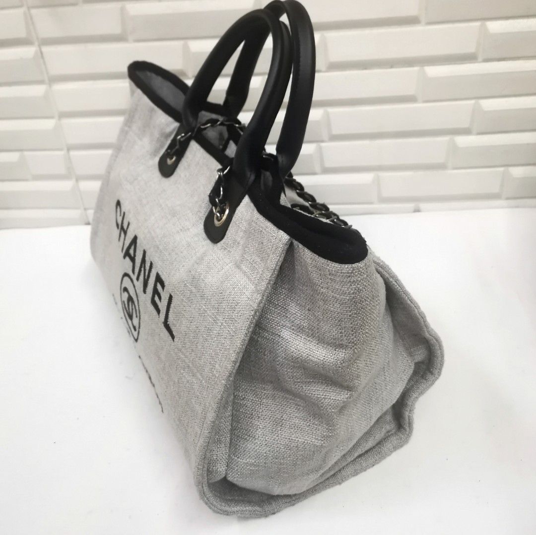 CHANEL Woven Straw Raffia Deauville Medium Tote Grey, Luxury, Bags &  Wallets on Carousell