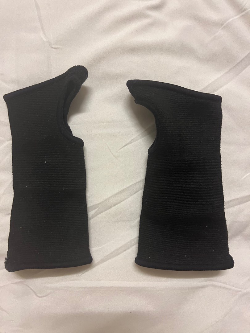 Like new Decathlon wrist braces. Great protection for all sports