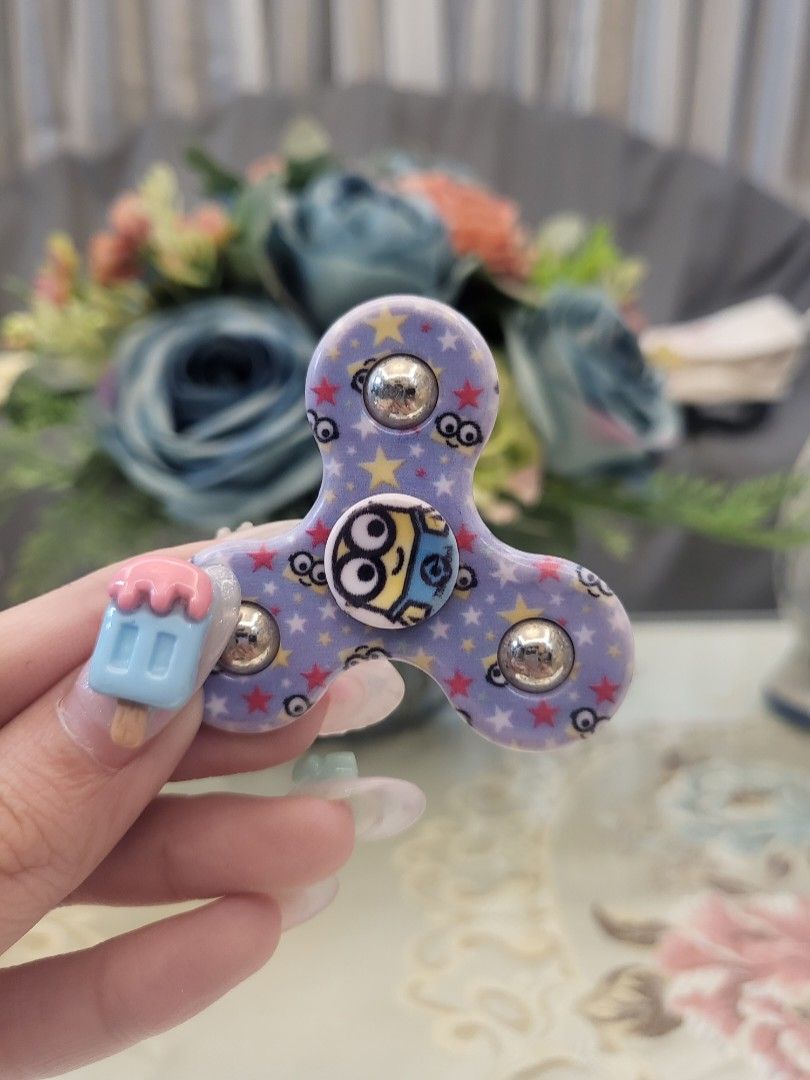 Minion Mini Fidget Spinner (Category: Character Goods) located in San Fernando. Submitted by jpmarketplace2023 (Listing ID 1267676155, Image 2). Description: -Minion mini fidget spinner for only PHP70 -Authentic from Japan.