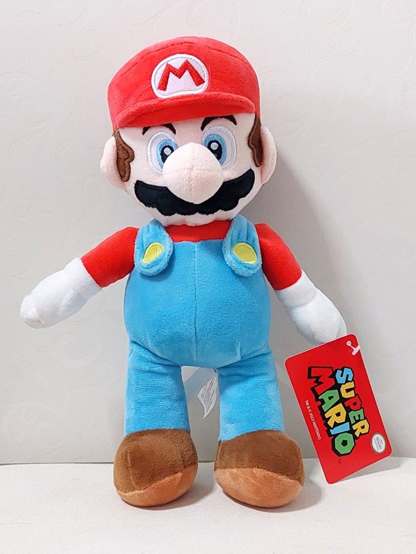 Official Nintendo Super Mario plushies Mario, Yoshi, Princess Peach