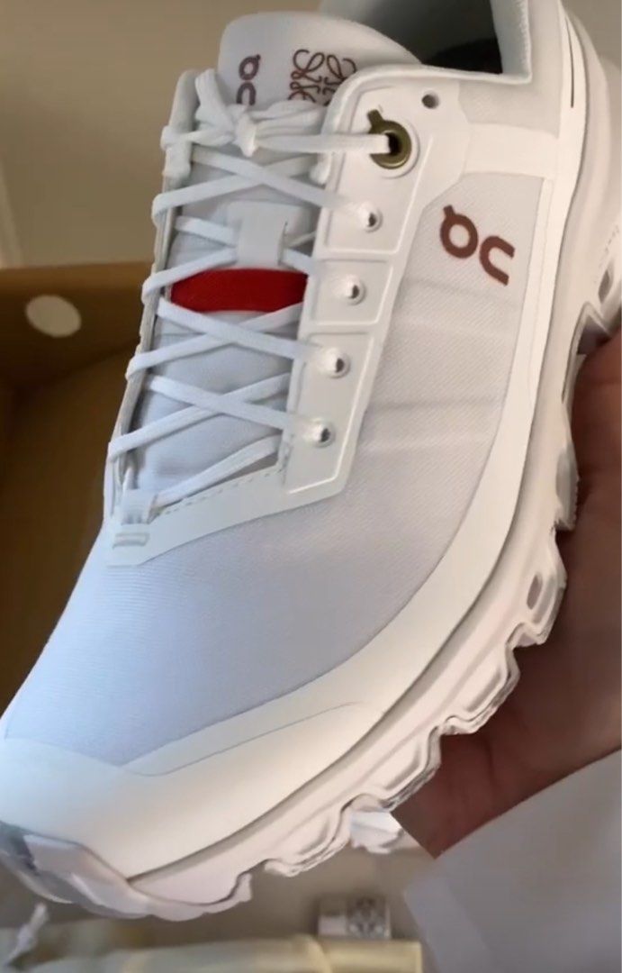 ON CLOUD + LOEWE sneakers white (white shoes) (Category: Sneakers) located in Pasig City. Submitted by bellafe_ (Listing ID 1267668204, Image 2). Description: Bought online, worn only once note: actual photo slightly yellowish .