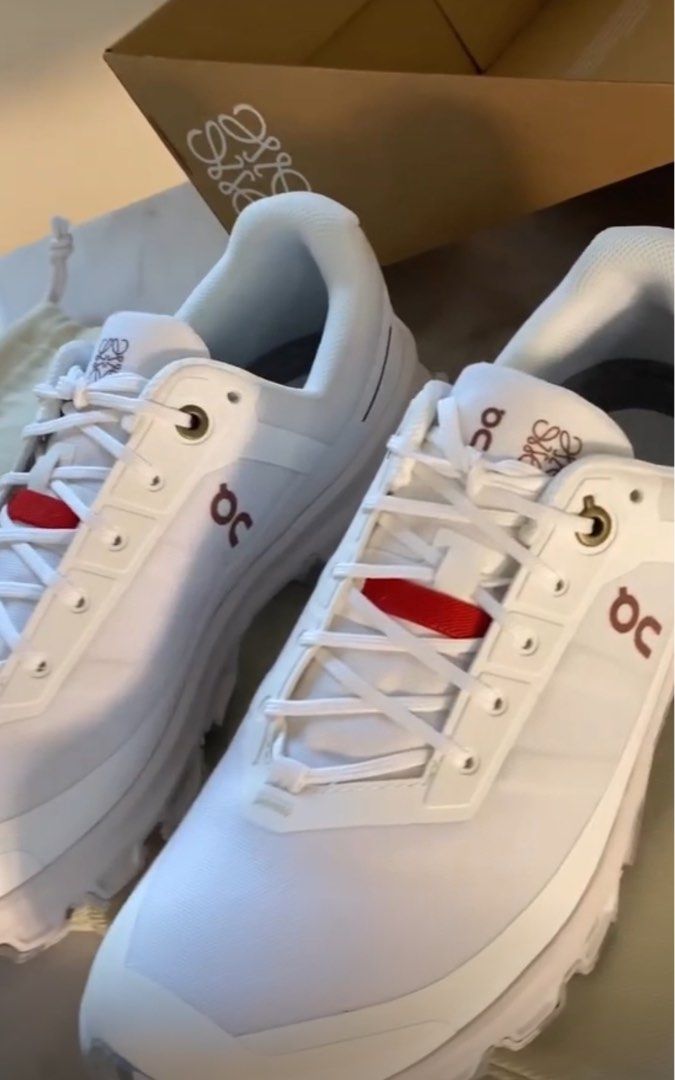 ON CLOUD + LOEWE sneakers white (white shoes) (Category: Sneakers) located in Pasig City. Submitted by bellafe_ (Listing ID 1267668204, Image 3). Description: Bought online, worn only once note: actual photo slightly yellowish .
