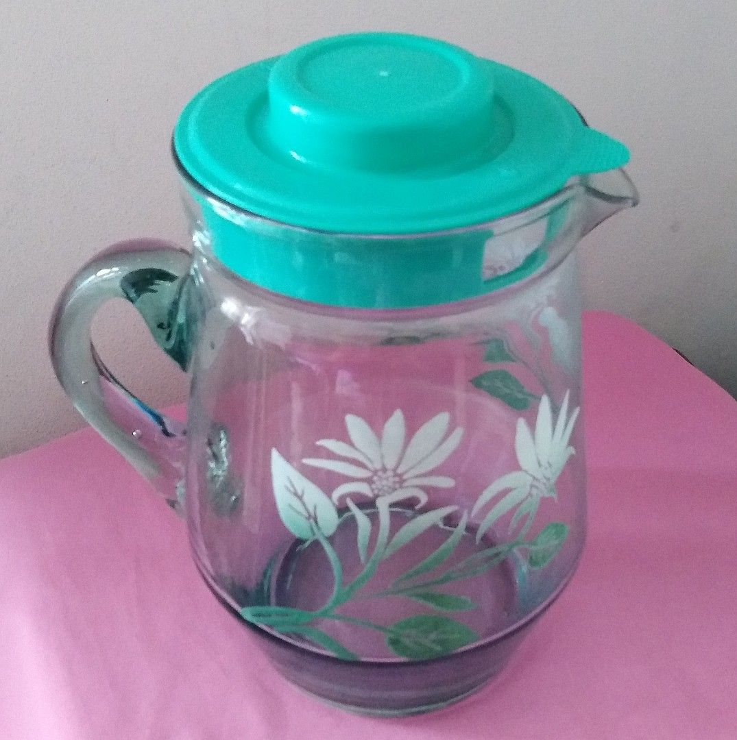 https://media.karousell.com/media/photos/products/2023/11/25/preloved_thick_glass_pitcher_1_1700906239_9986221d_progressive.jpg