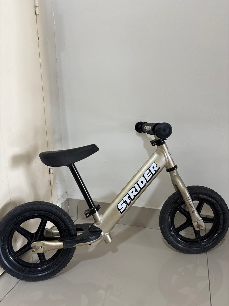 Strider pro gold balance bike