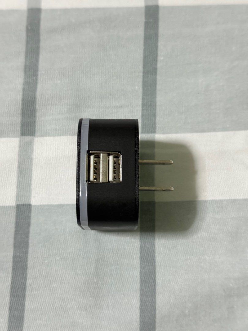 USB Travel Adaptor (Category: Cables & Adaptors) located in Quezon City. Submitted by soldoutmnl (Listing ID 1267645128, Image 2). Description: USB Travel Adaptor.