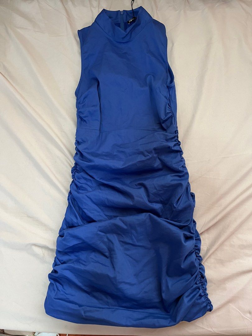 Zara Blue Dress (Category: Dresses) located in Cainta. Submitted by arideclutter (Listing ID 1266048538, Image 3). Description: Zara Blue Dress Brand new, never been used with tag Size: xs Ruched design, super fit and flattering! It's soo nice I wouldn't sell this if it fit me!! Perfect for the upcoming holidays! RFS: wrong size Actual pics posted :) .