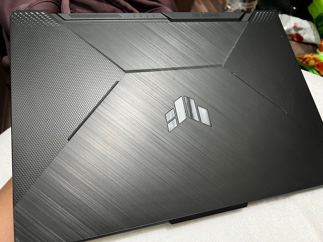 ASUS TUF F15 (Category: Laptops & Notebooks) located in Manila. Submitted by declutter_mnl__ (Listing ID 1267890141, Image 2). Description: SRP: 57,999 Lightly used, never used for gaming purposes/editing/rendering Bought August 2022, with box, charger and under 2yrs warranty pa. Ginagamit ko lang talaga siya as a second monitor for my work online. No issues other than signs of usage like marks but no dents at all. Not sure din if saan galing yun
