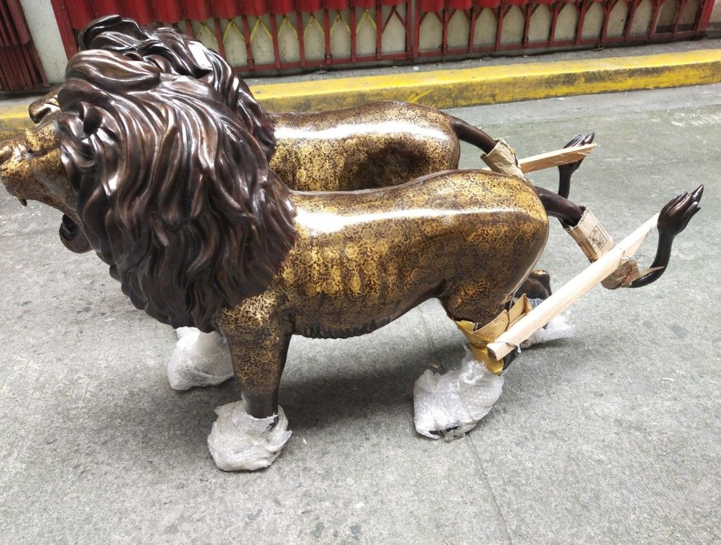 Brass life size lion statue pair display (Category: Figurines & Statues) located in Manila. Submitted by kurukutuk (Listing ID 1267933758, Image 2). Description: brass life size lion statue pair display 34 x 56 inches HxL made of brass.
