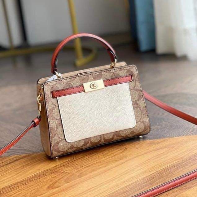 Coach Lane Carryall Mini (Category: Luxury Bags & Wallets) located in Rizal. Submitted by LuxbyMarifrance (Listing ID 1267868466, Image 1). Description: 🏷️ 2,800 only + SF 💼 Coach Lane Carryall in Colorblock Mini 📏 12 1/2″ (L) x 8 3/4″ (H) x 4 3/4″ (W) 📌 with dust bag and paper bag ✨All trademarks, logos and brand names are reserved and property of the original brand owners. #coachph #authenticqualitybagsph #authenticqualitybags #lowestpriceg