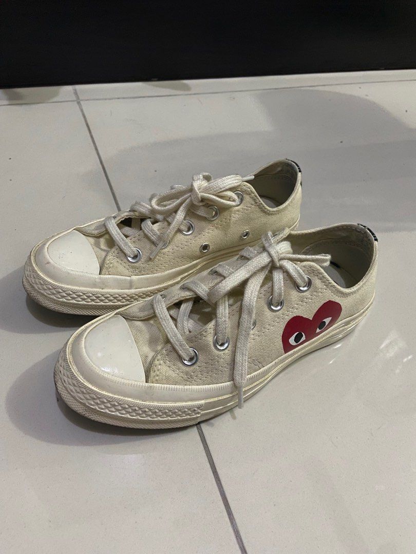 Converse CDG Low White/Cream (Category: Sneakers) located in Quezon City. Submitted by itsyanaaaaaa (Listing ID 1267787099, Image 2). Description: Size: 22 cm Colorway: Milk/White-High Risk Red Used with care Got this from Greenbelt 5 but I don’t have the box anymore Fixed price Last price posted Payment via Gcash or COD Last price posted I will not entertain questions with answers that are already posted.