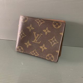 Louis Vuitton Monogram Taurillon Illusion Vertical Zippy Wallet