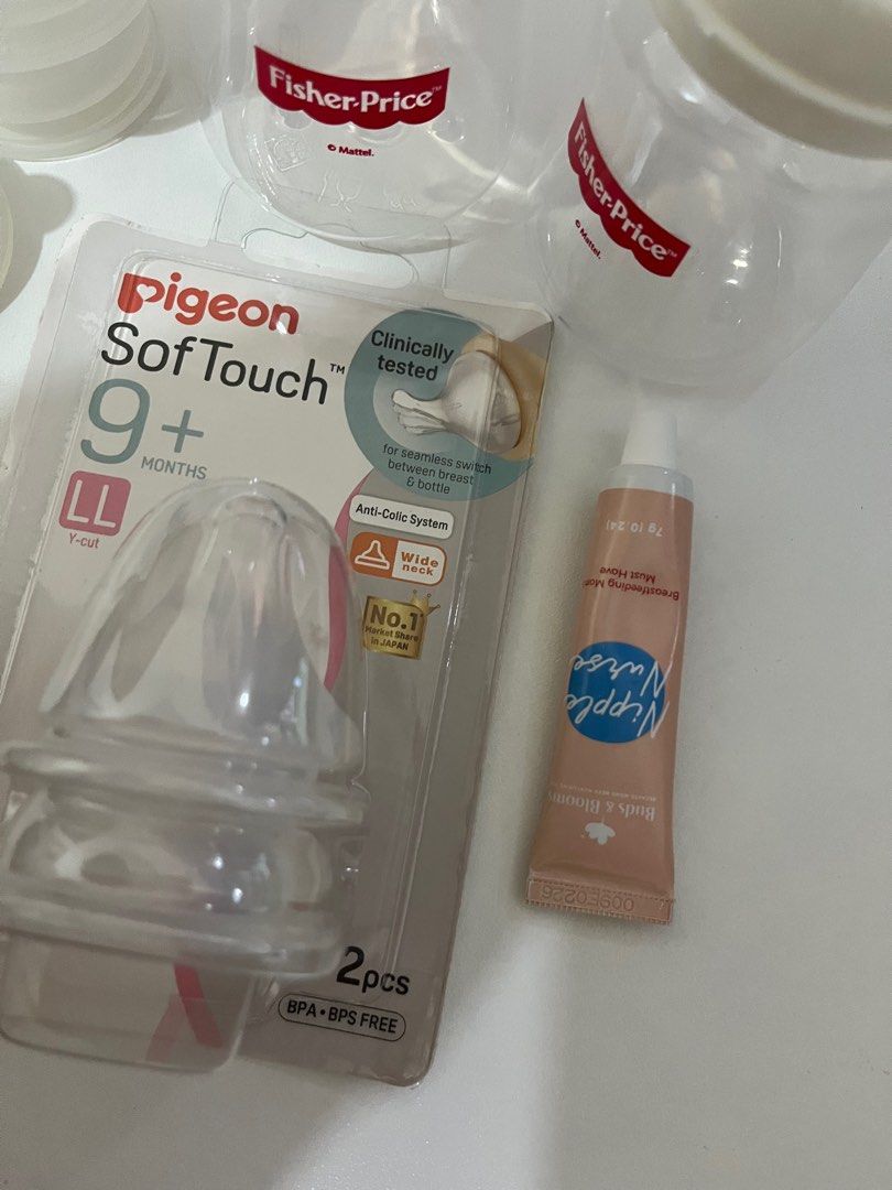 Newborn Items (Category: Breastfeeding & Bottle Feeding) located in Marikina City. Submitted by miaaaooow (Listing ID 1267878670, Image 3). Description: -Brand new Pigeon SoftTouch Wide Neck Nipple for 9+ months - got it for free sa bottle -4 pcs preloved Pigeon SoftTouch Wide Neck Nipple for 3+ months - ayaw ng baby ko, nalulunod po siya -2 pcs preloved pacifiers (for 0-3 months) Freebie na po yung nipple cream (2-3 times lang nagamit) and Fishe