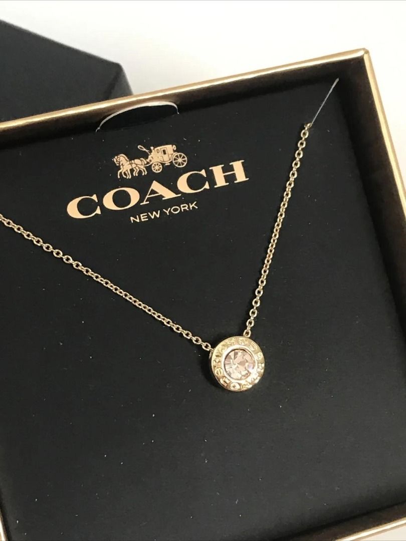 Coach open circle stone strand necklace top