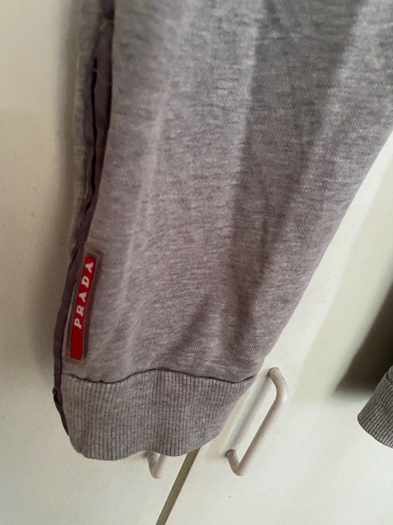 Prada grey jogging pants (Category: Joggers) located in Butuan. Submitted by natalday (Listing ID 1267739692, Image 2). Description: large size.