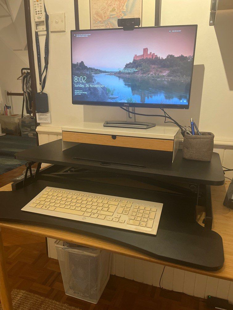 Self rising desk deals