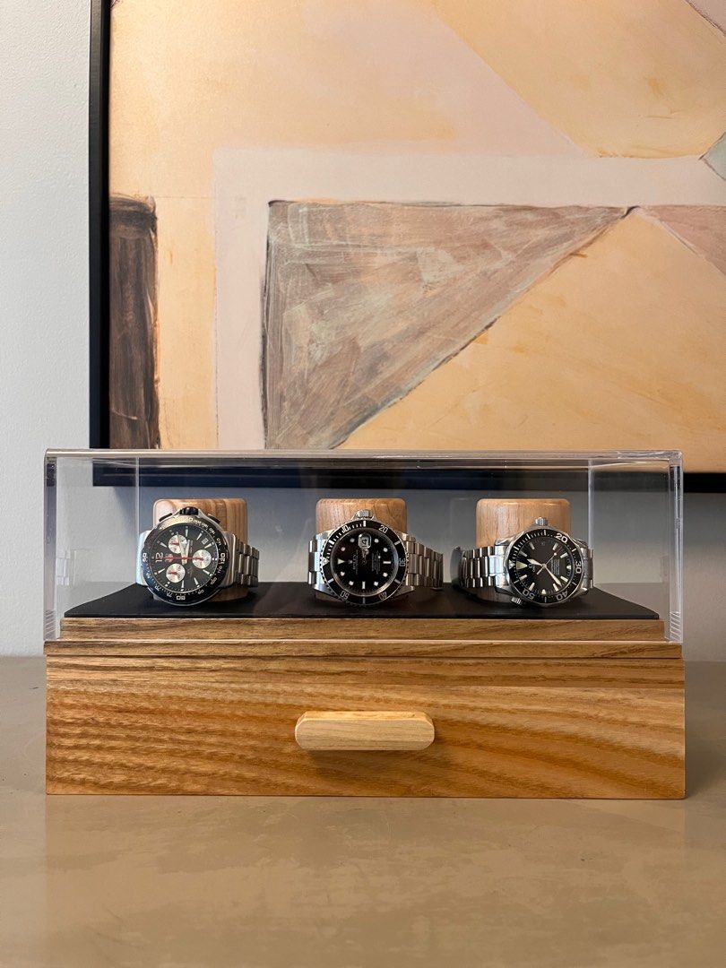 Watch Display box and Organizer (Category: Storage Boxes & Baskets) located in Las Pinas. Submitted by lc2001 (Listing ID 1267824319, Image 2). Description: 4 Slots Watch Display - Php 4,500 Available colors: Walnut brown and Black 3 Slots Watch Display - Php 4,000 Available colors: Walnut brown and Natural Ash Organizer w/ charging for phone and tablet -Php 3,500 Availbale colors: Natural Ash and Black All of our products are made of Solid Ash W