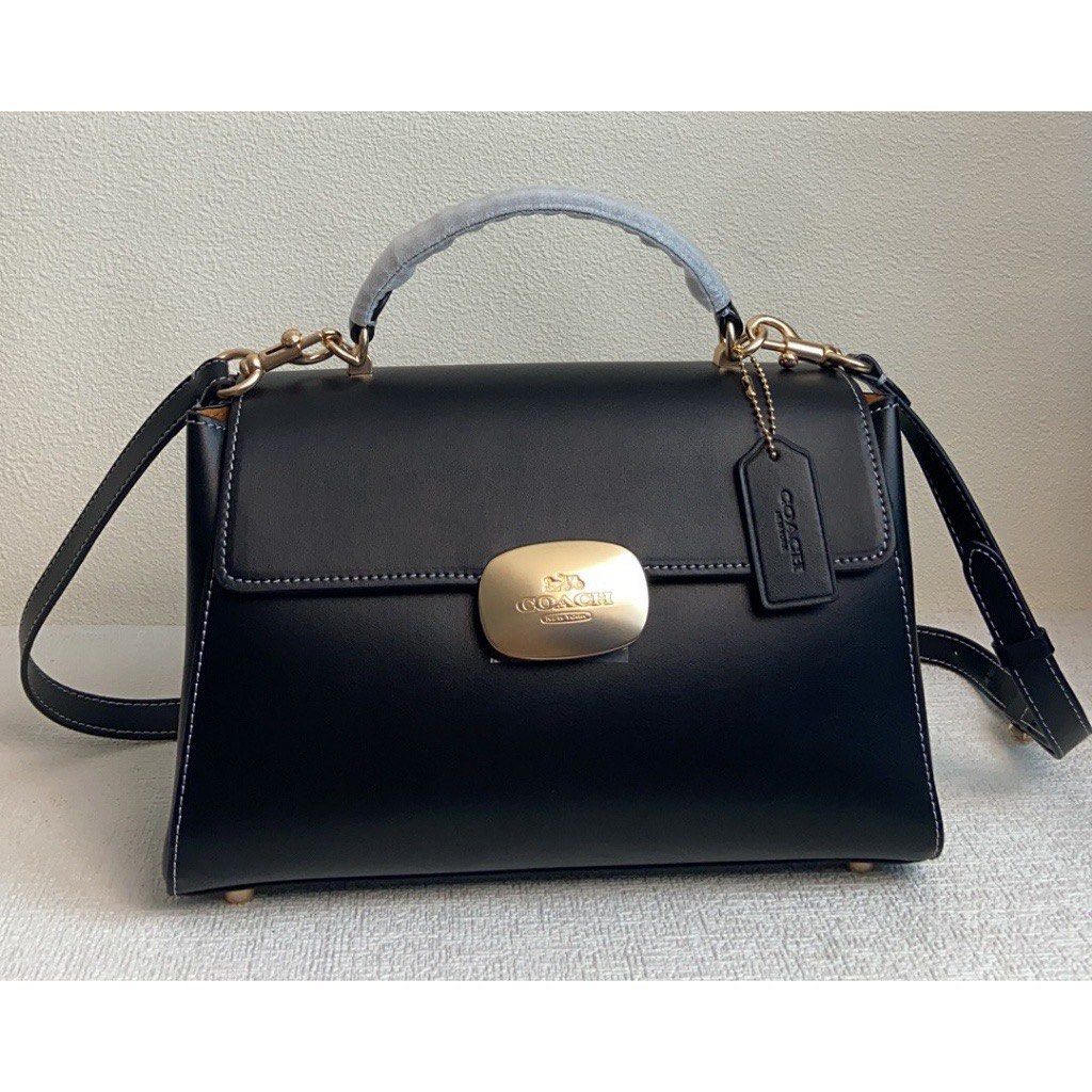 Coach Eliza top handle (Category: Luxury Bags & Wallets) located in Las Pinas. Submitted by yhn_boutique (Listing ID 1268102831, Image 1). Description: NEW ARRIVAL Cod via lalamove/ grab -🛵 same day delivery J&T/LBC - pay today ship today Complete inclusions .