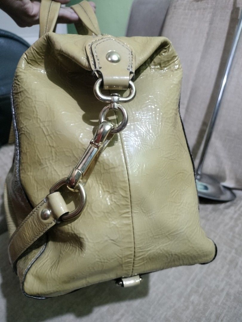 Gold coach purse with purple lining sales