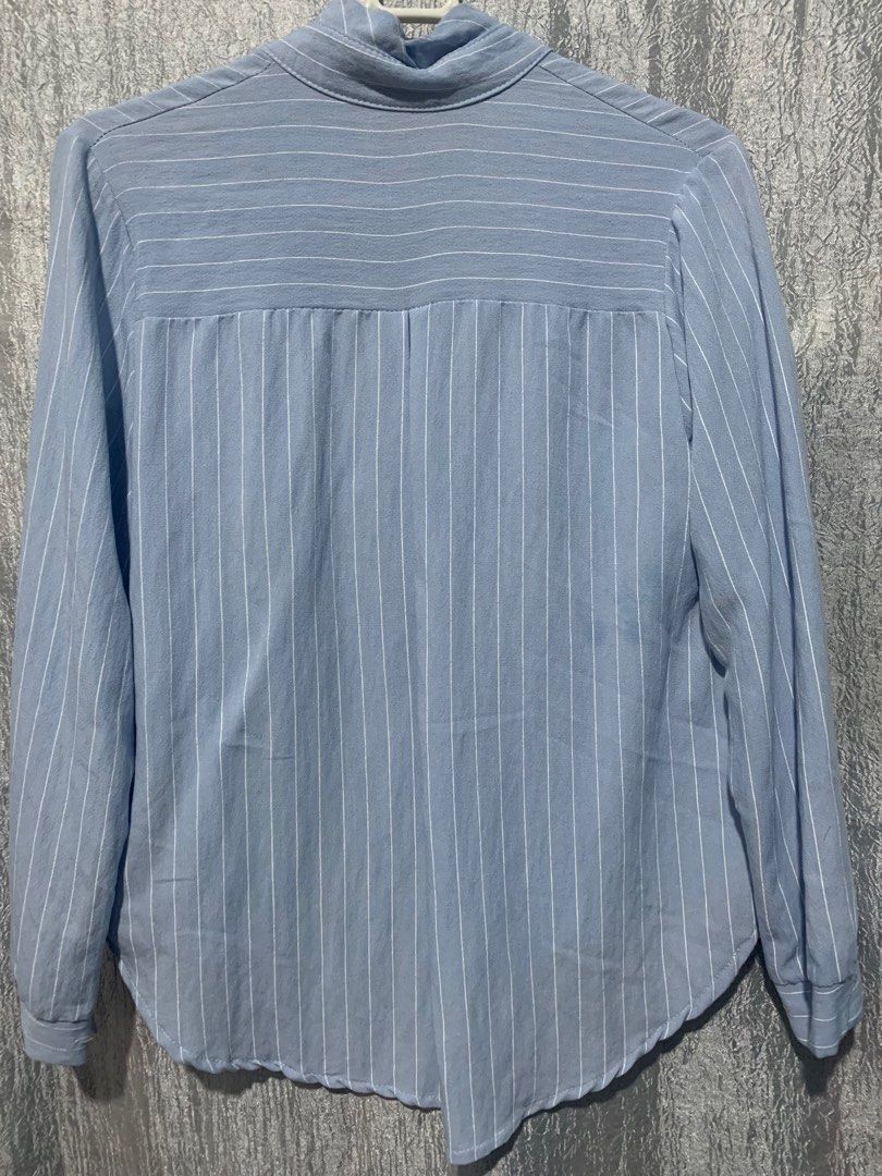 Cropped Striped Powder Blue Button Down Polo Shirt (Category: Blouses) located in Quezon City. Submitted by maria16_ (Listing ID 1268000885, Image 2). Description: Fits sizes S-M Rarely used. No issues. Location: Regalado, QC.