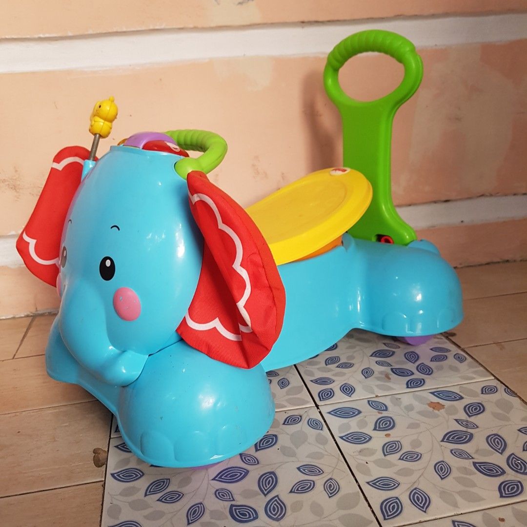Fisher price elephant bounce and ride top