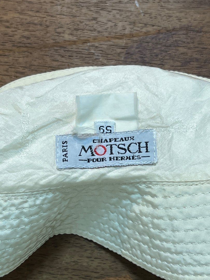 Hermes bucket hat (Category: Luxury Accessories) located in Quezon City. Submitted by raccoonfur (Listing ID 1268077391, Image 3). Description: White nylon bucket hat by Hermes. Signature leather zip. Faded content tag. Great condition nonetheless. .