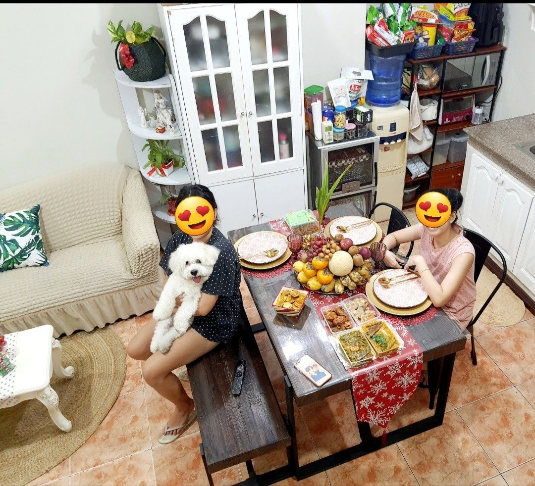 Modern wooden dining table and chairs (Category: Tables & Sets) located in Quezon City. Submitted by jenserr (Listing ID 1267949734, Image 3). Description: Modern elegant design. Dining table 4 seater Wooden rustic design top with steel footing Seats 2 metal chairs and 1bench type wooden seat with steel footing with free 2 table runners and thick place cover for protection. Moving out sale Address is near Lightforce Congressional.