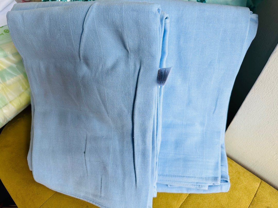 Muslin baby wrap/blanket/towel (Category: Maternity Care) located in Mandaluyong City. Submitted by splashfashion.ph (Listing ID 1267945917, Image 1). Description: Available colors Blue and white.