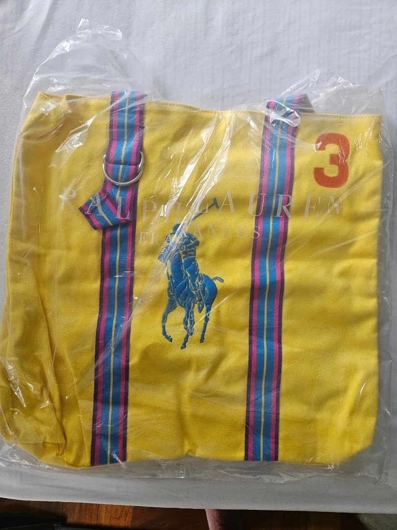 Original Ralph Lauren Tote Bag (Category: Tote Bags) located in Makati City. Submitted by crossco88 (Listing ID 1268002325, Image 1). Description: original Yellow Ralph Lauren Tote Bag never used, brand new rfs: don't use tote bags price is negotiable delivery c/o buyer.