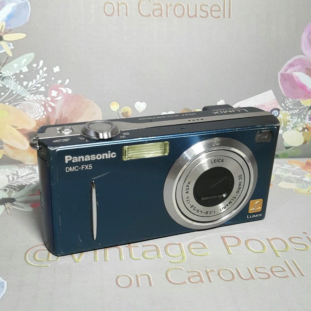 Panasonic Lumix DMC FX5 CCD Camera (Category: Cameras) located in Paranaque City. Submitted by vintagepopsicle (Listing ID 1268035404, Image 1). Description: Ugaliin Nating Magbasa bago magtanong para maayos usapan. Leica Lens on a Lumix CCD. Tested working with interesting options and modes such as clip movies, macro etc. - Leica lens with optical viewfinder. Enables you to Shoot in full sun. - Will include original battery so you can test it ou