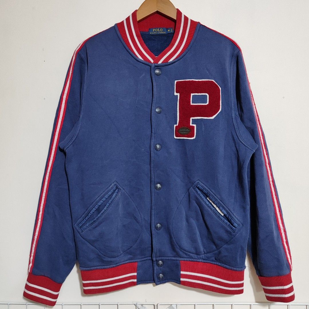 Polo Ralph Lauren Varsity Jacket (Category: Coats, Jackets and Outerwear) located in Puerto Princesa. Submitted by theoldtreasures (Listing ID 1268035713, Image 1). Description: Size: Medium on tag Issue(s): lints, discoloration fading 8/10 or better condition Measurements: 22" pit to pit 27.5" length 18" shoulder 25" sleeves Manage your expectations. Thrifted!.