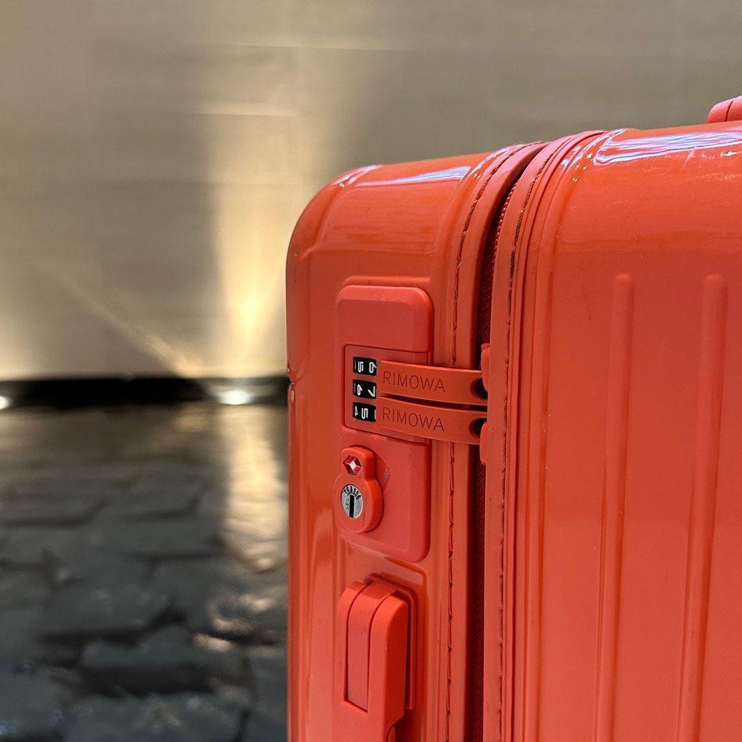 Rimowa on sale orange luggage