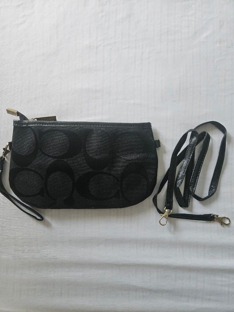 Vintage Coach Clutch bag (Category: Luxury Bags & Wallets) located in Makati City. Submitted by crossco88 (Listing ID 1268003532, Image 3). Description: vintage Coach clutch bag with strap brand new, never used. high price due to its logo being one solid metal and not just embroidered. rfs not being used price is negotiable delivery c/o buyer.