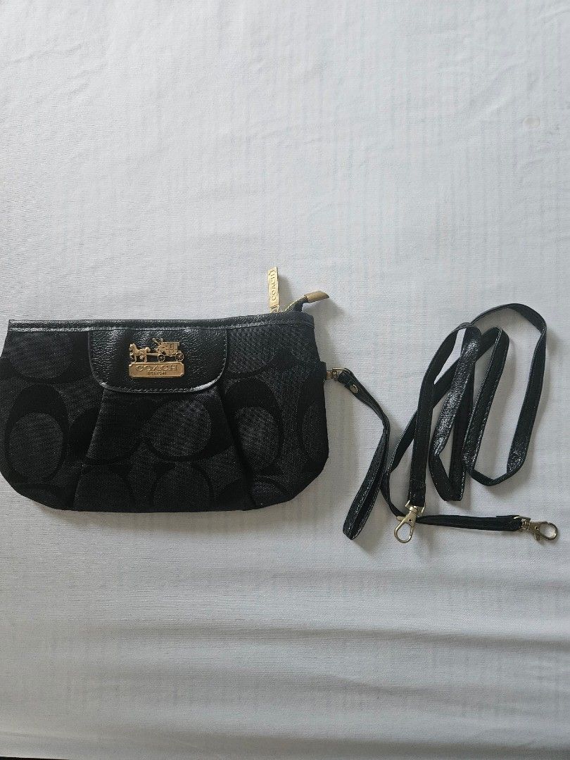 Vintage Coach Clutch bag (Category: Luxury Bags & Wallets) located in Makati City. Submitted by crossco88 (Listing ID 1268003532, Image 2). Description: vintage Coach clutch bag with strap brand new, never used. high price due to its logo being one solid metal and not just embroidered. rfs not being used price is negotiable delivery c/o buyer.