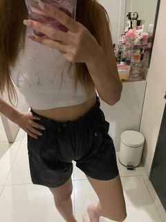Black leather short pants