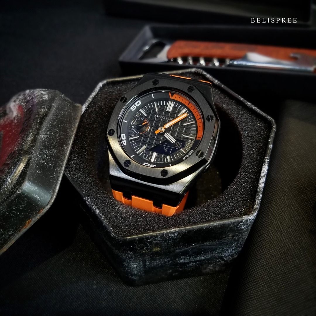 G shock watches orange and black top