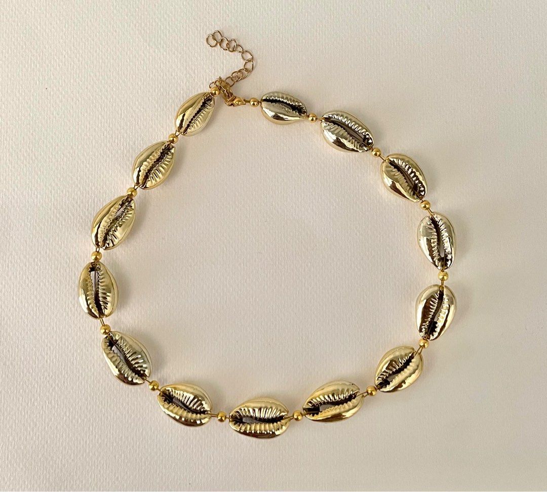 Cowrie Shell Necklace in Gold (Category: Necklaces) located in Manila. Submitted by lazythrifter.ph (Listing ID 1268204246, Image 1). Description: Own Design Electroplated Cowrie Shell Beads Choker Type Length: 15”, with extension 17” .
