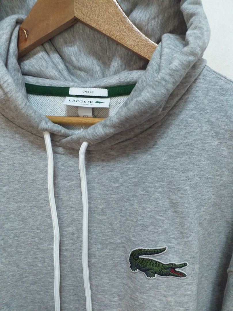 Lacoste Pullover Hoodie (Category: Coats, Jackets and Outerwear) located in Taguig. Submitted by moreken1985 (Listing ID 1268211032, Image 2). Description: Lacoste Pullover Hoodie FR 6 / US XL (Unisex) Dimens (24x28) Excellent as new condition with tag 4,500 only SF always yours Mop/Gcash Taguig Location 📍.