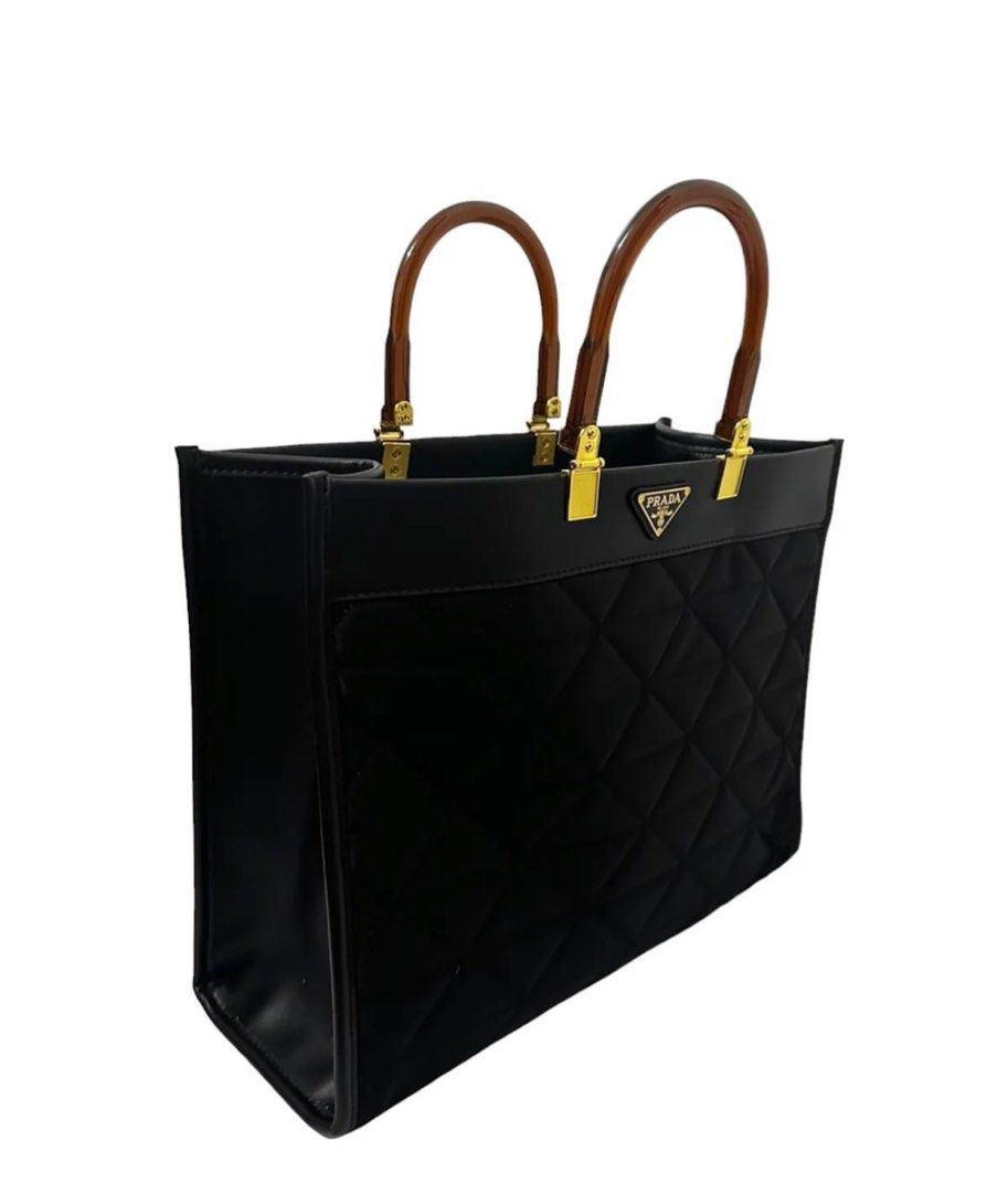 Preloved Prada Tote Bag - Quilted (Category: Luxury Bags & Wallets) located in Binan City. Submitted by mcsolis (Listing ID 1268205913, Image 3). Description: Good as new. No flaws With dust bag What you see is what you get Japan ukay .