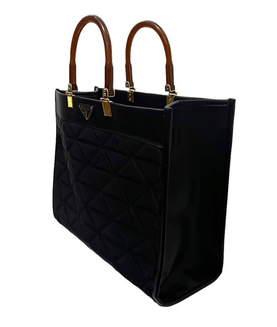 Preloved Prada Tote Bag - Quilted (Category: Luxury Bags & Wallets) located in Binan City. Submitted by mcsolis (Listing ID 1268205913, Image 2). Description: Good as new. No flaws With dust bag What you see is what you get Japan ukay .
