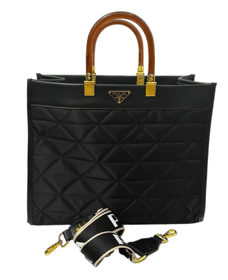 Preloved Prada Tote Bag - Quilted (Category: Luxury Bags & Wallets) located in Binan City. Submitted by mcsolis (Listing ID 1268205913, Image 1). Description: Good as new. No flaws With dust bag What you see is what you get Japan ukay .