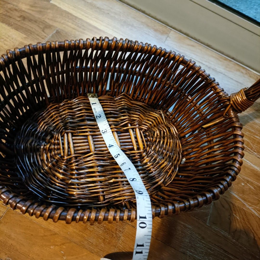 A closer look at Polishing Wicker Basket Furniture In Living Room With Wax