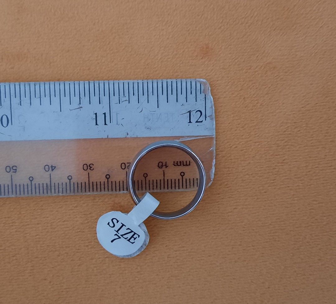 Silver Ring (Category: Rings) located in Singapore. Submitted by christmas007 (Listing ID 1268192051, Image 2). Description: Smooth round ring. No design. Can try for size before buying. (@ Marsiling mrt station only).