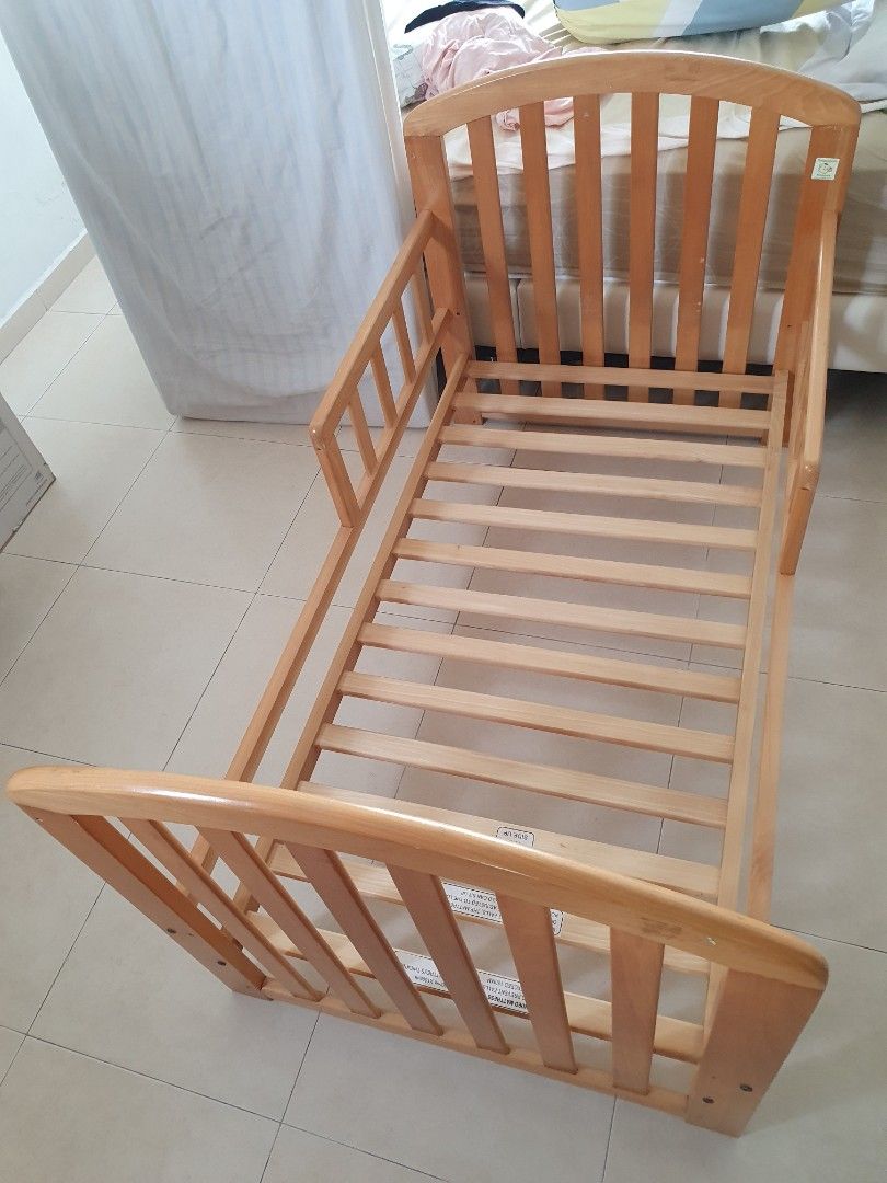 Well used baby cot that can be converted to a toddler bed, Babies ...