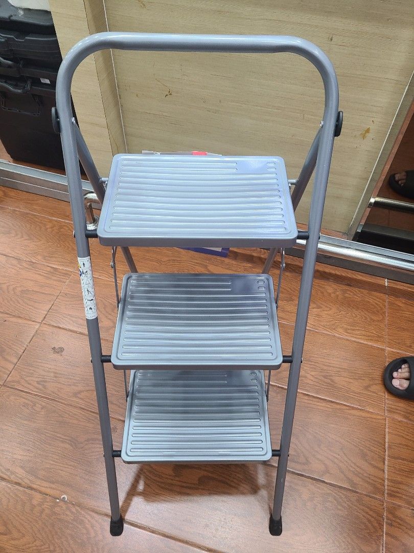 3 step metal steel foldable ladder (Category: Ladders & Steps) located in Pasig City. Submitted by js.authenticlux (Listing ID 1268515499, Image 1). Description: *brandnew heavy duty 3 step metal steel ladder * foldable and portable * call txt 09178029682.